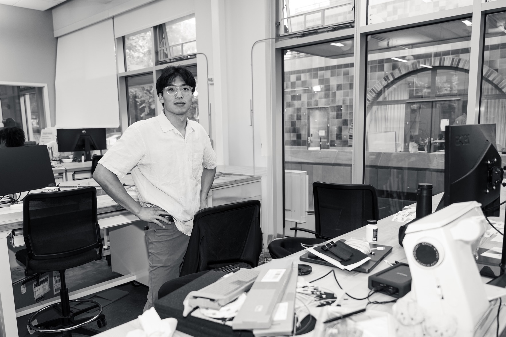 Thom standing in the design studio